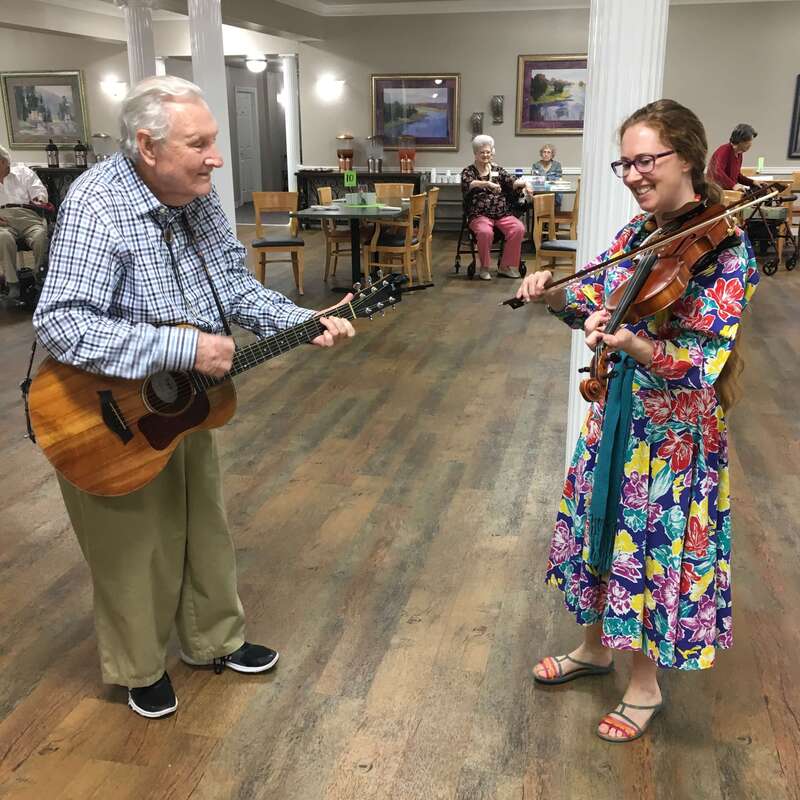 Fiddle and guitar players at a Senior Living Home in Oklahoma City.