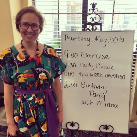 Oklahoma Senior Living musician, Minna Biggs, celebrates a birthday in colorful attire. 