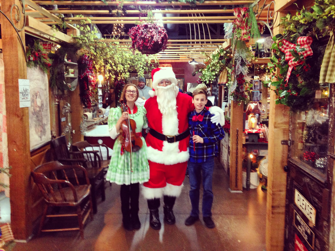 Farmers Daughter Market, Santa Clause, Tecumseh, Oklahoma, Christmas Music, Country Christmas, Holiday Party, Fiddle, Violin, Minna Biggs, August Biggs, tin Whistle, live music